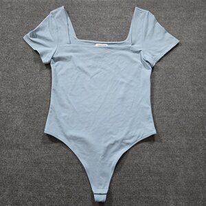 Aritzia Contour Square Neck Bodysuit L Powder Blue SS Thong Snaps Stretch Casual